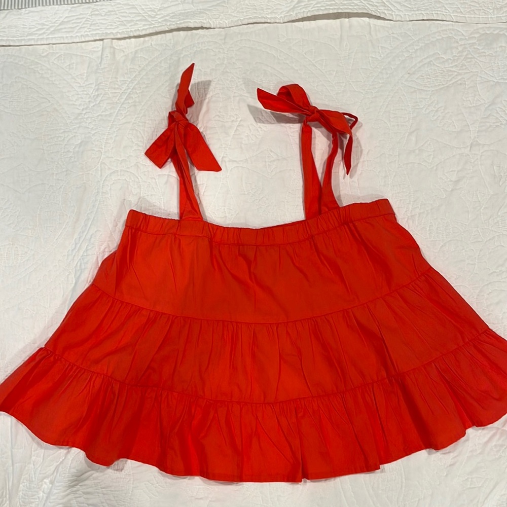 Orange/coral American Eagle tank swing top.